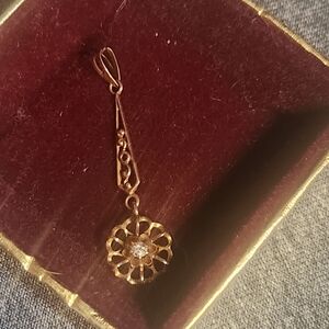 Elegant 10kt Gold Pendant with Diamond Accent